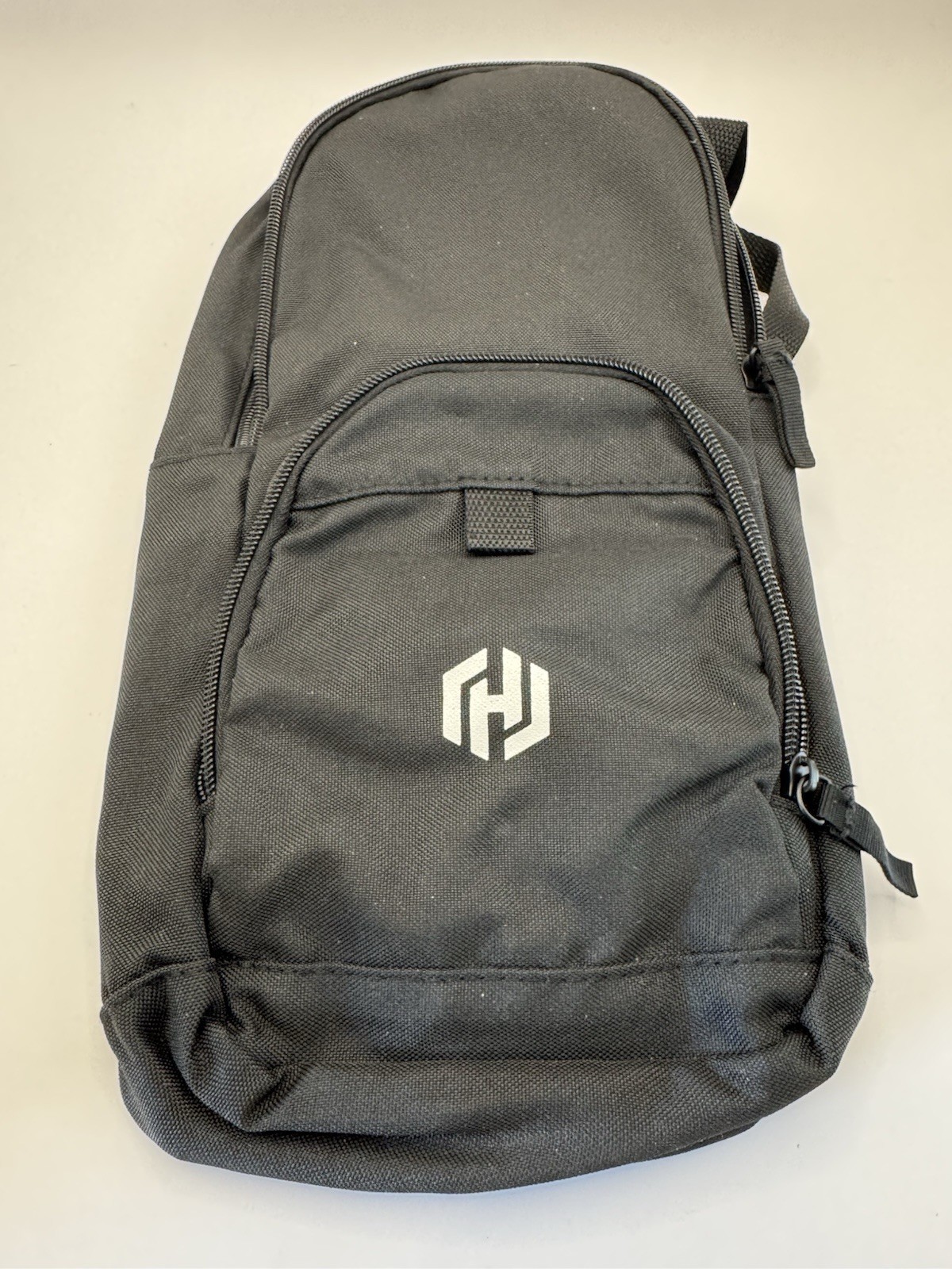 Gemline Black Multi Pocket Zip Sling Messenger Crossbody Bag, HashiCorp logo