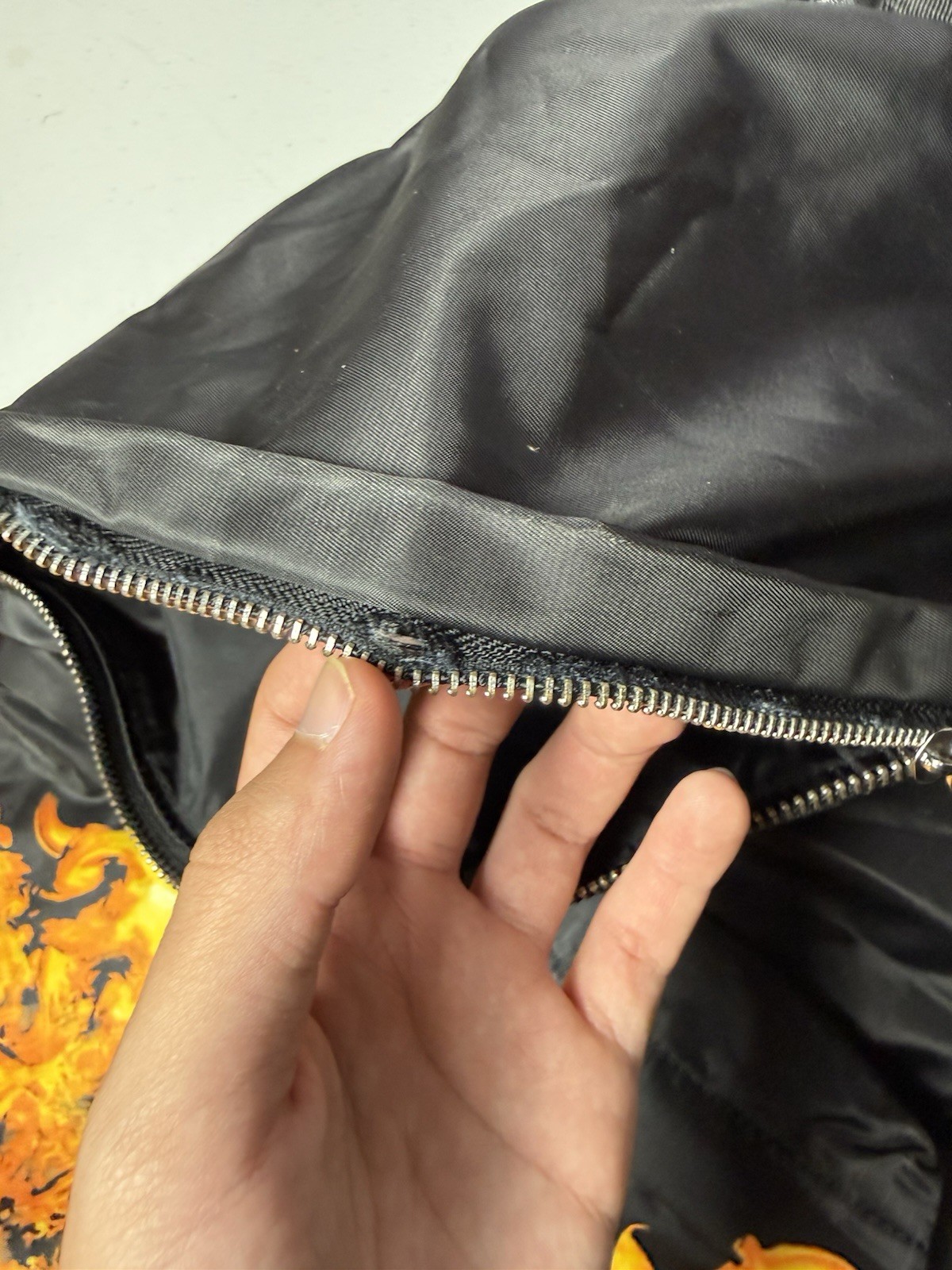 Givenchy Leather Trimmed Flame Backpack – Black Backpacks flaws in pictures beat