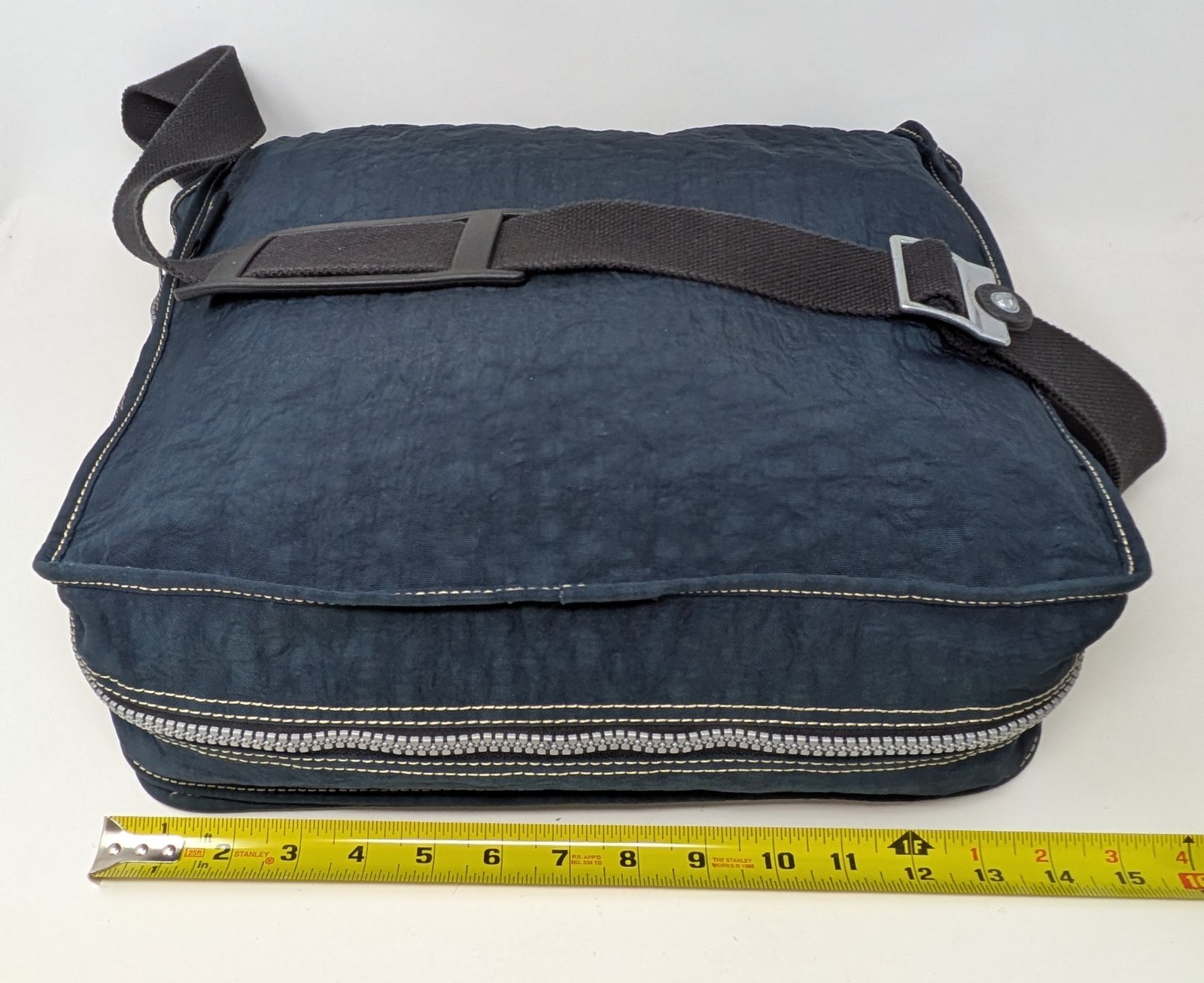 Kipling Madhouse Postman Bag Mirage Las Vegas Logo Expandable Messenger Bag Blue