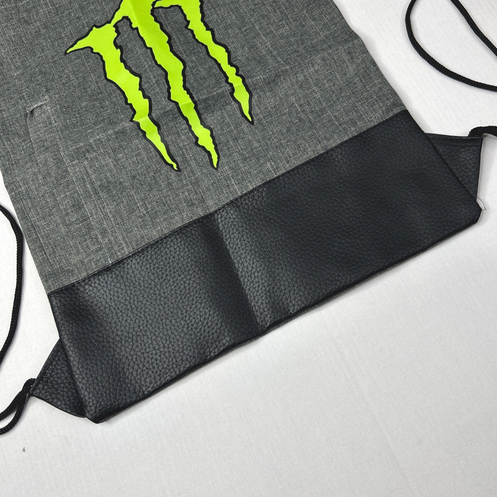 Monster Energy Drawstring Cinch Backpack Gray Front Zipper Pocket Green Logo