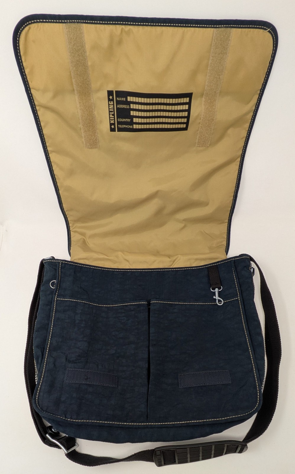 Kipling Madhouse Postman Bag Mirage Las Vegas Logo Expandable Messenger Bag Blue