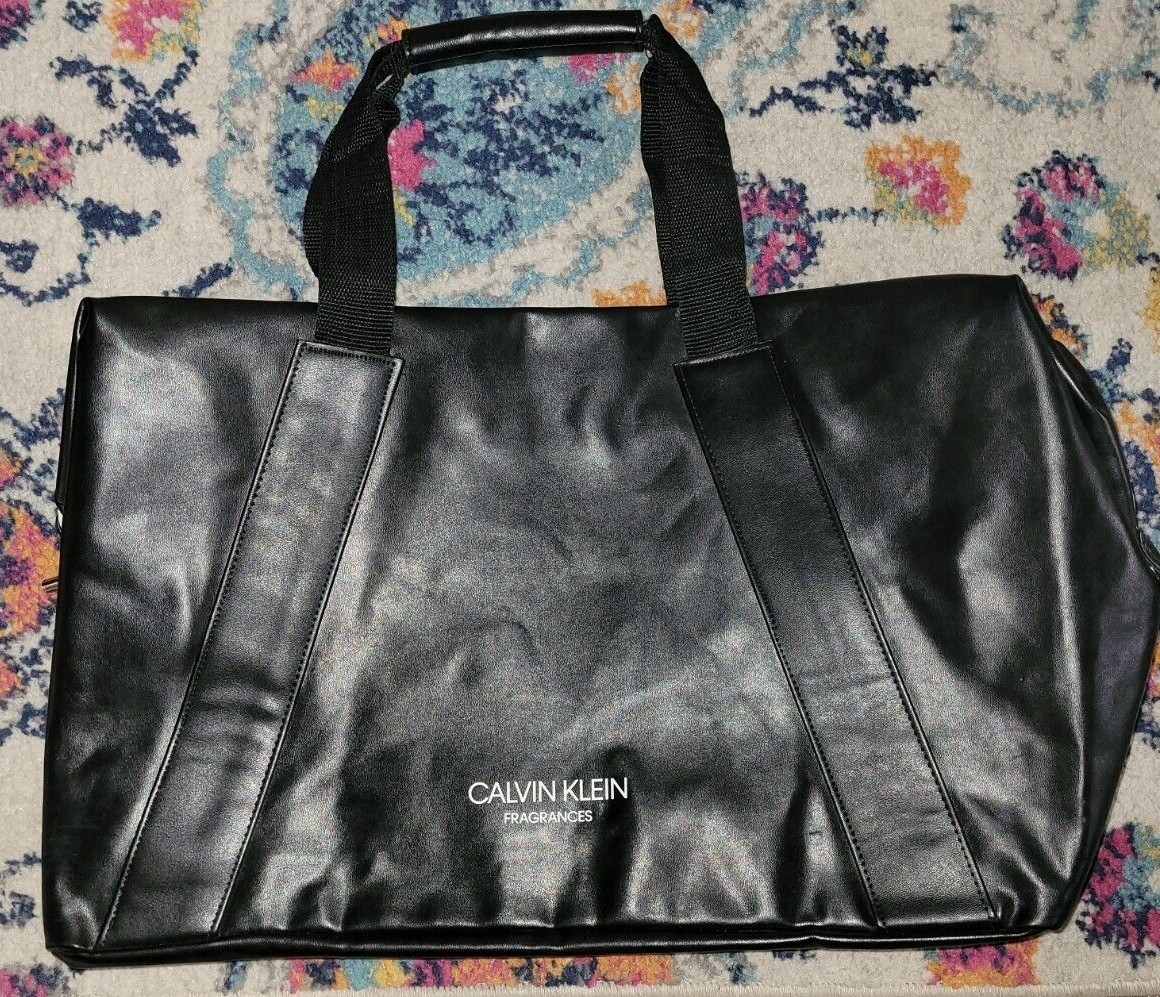 Calvin Klein Fragrances Faux Leather Vinyl Type Bag