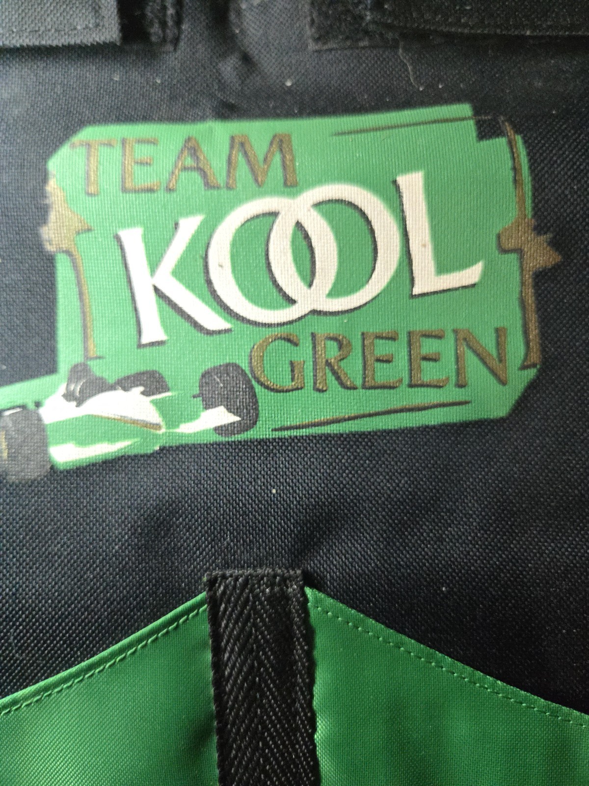 VINTAGE KOOL Black/Green Folding Hanging Cap-Caddy, 12–Pocket, Hook/Loop Closure