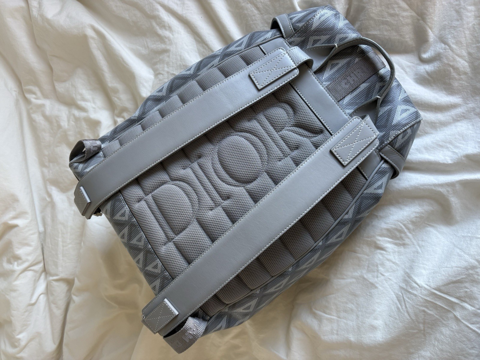Dior Men’s Hit the Road backpack daypack.