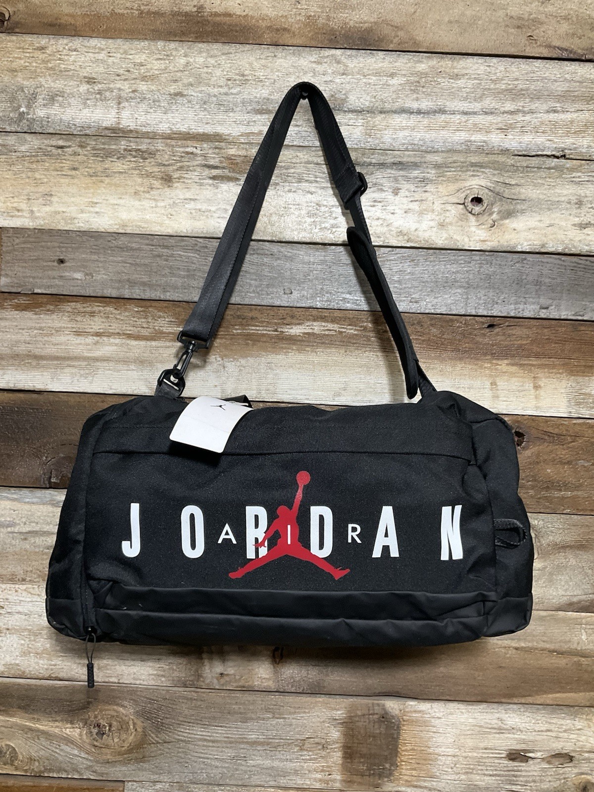 Jordan Velocity Duffle bag in black with a red Jumpman logo