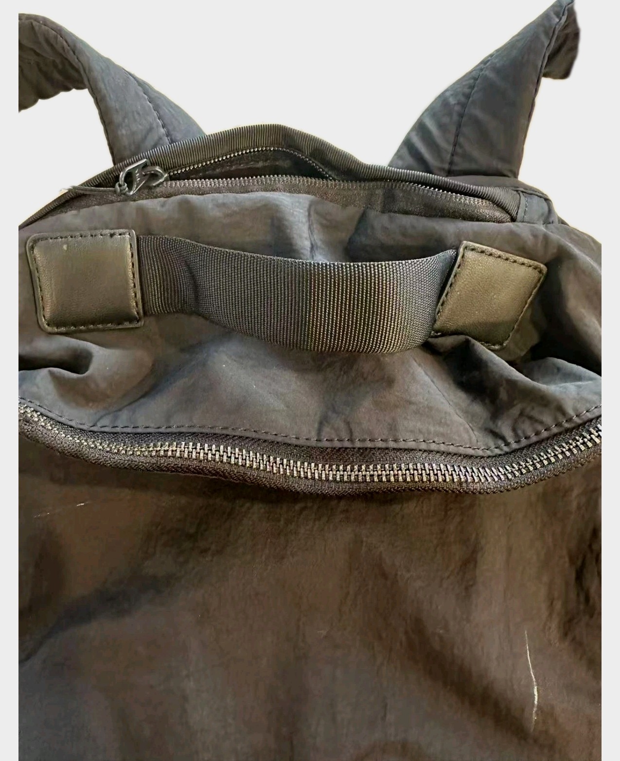 Black Lululemon City Adventurer backpack,iconic metal logo and waterproof fabric