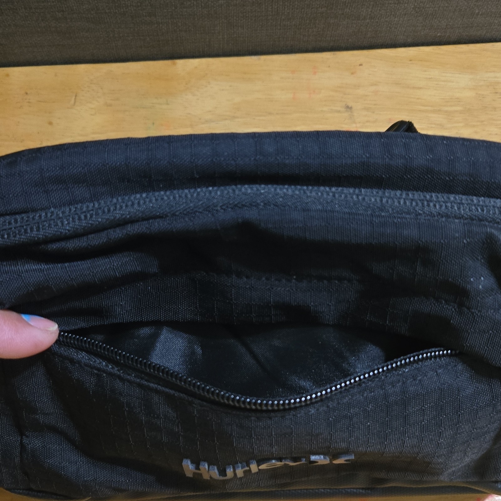 Hurley Black Crossbody Bag Adjustable Strap Inner Pockets Casual Travel