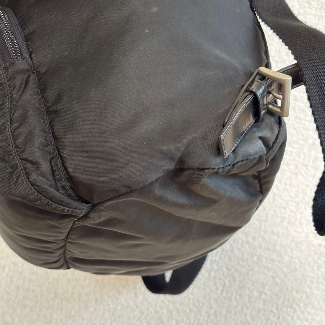 Prada Rucks Saffiano Triangular Plate