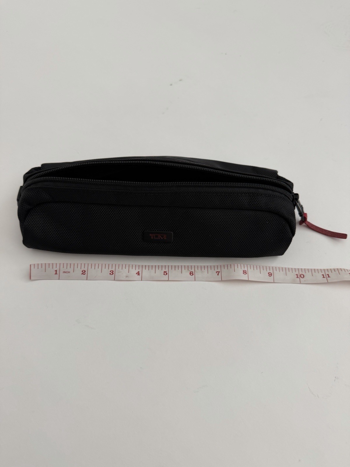 Tumi Alpha Electronic Cord Pouch in black ballistic nylon Travel Accessories