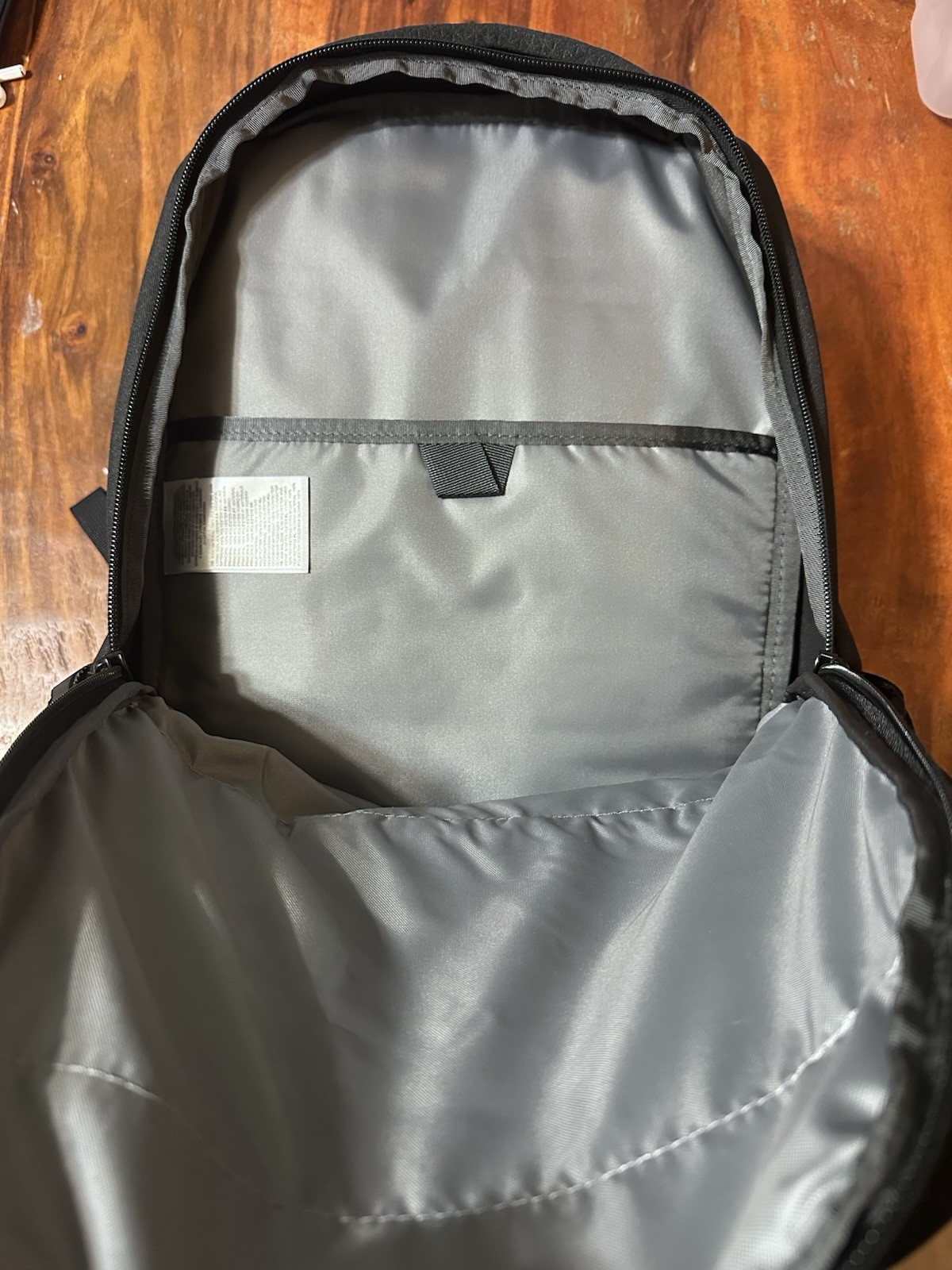 The North Face Stalwart Black Backpack 26L Laptop Sleeve Company Logo