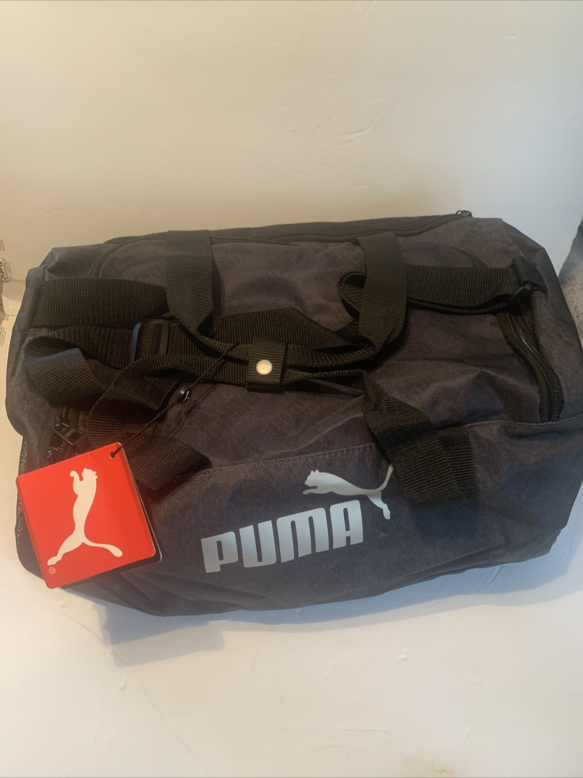 Puma unisex 20 inch Black duffel bag new with tags