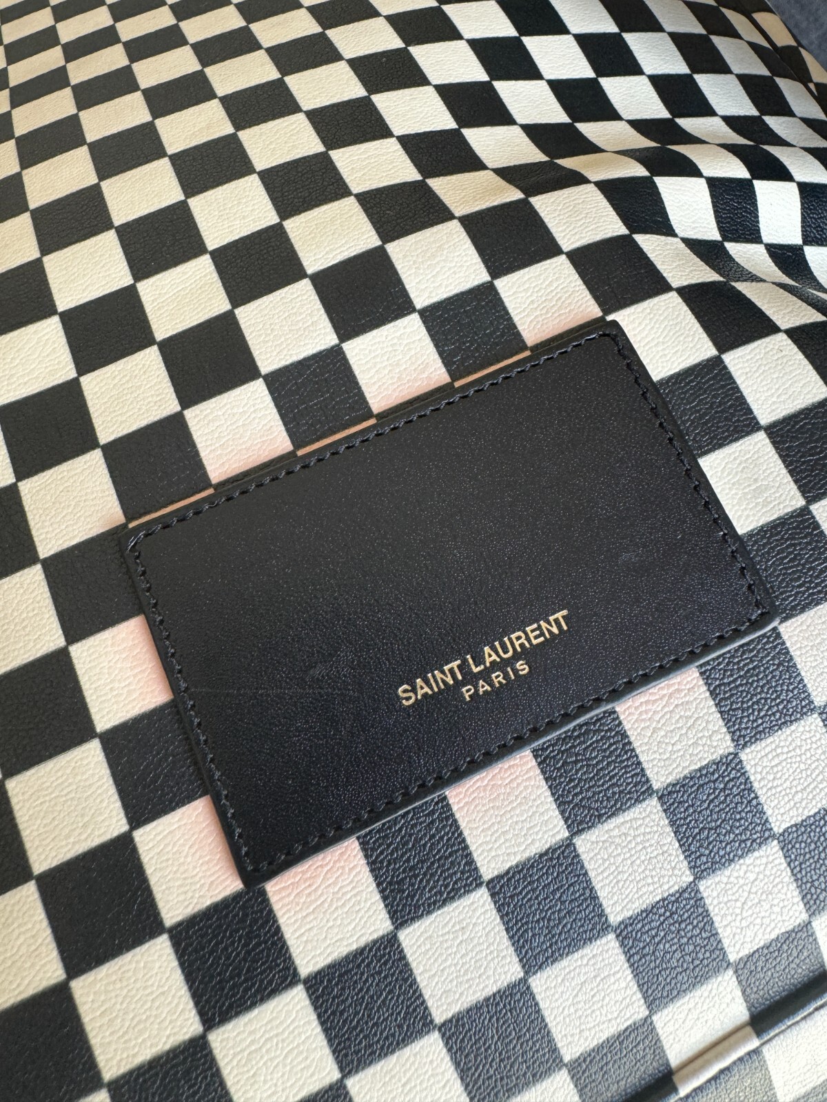 Saint Laurent Black & White Checkered Backpack (discoloration and fraying)