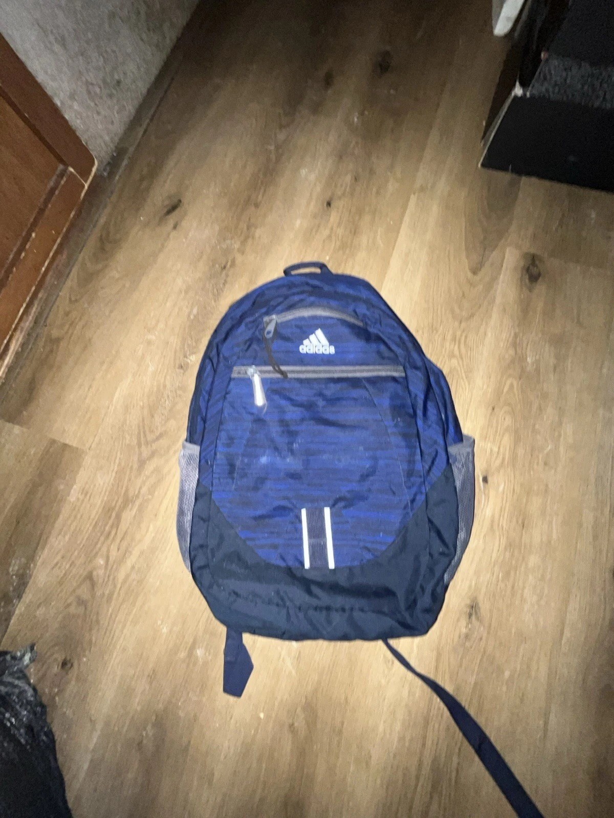 Adidas Blue Backpack with Vertical Black Stripes and Grey and Black Accents Used
