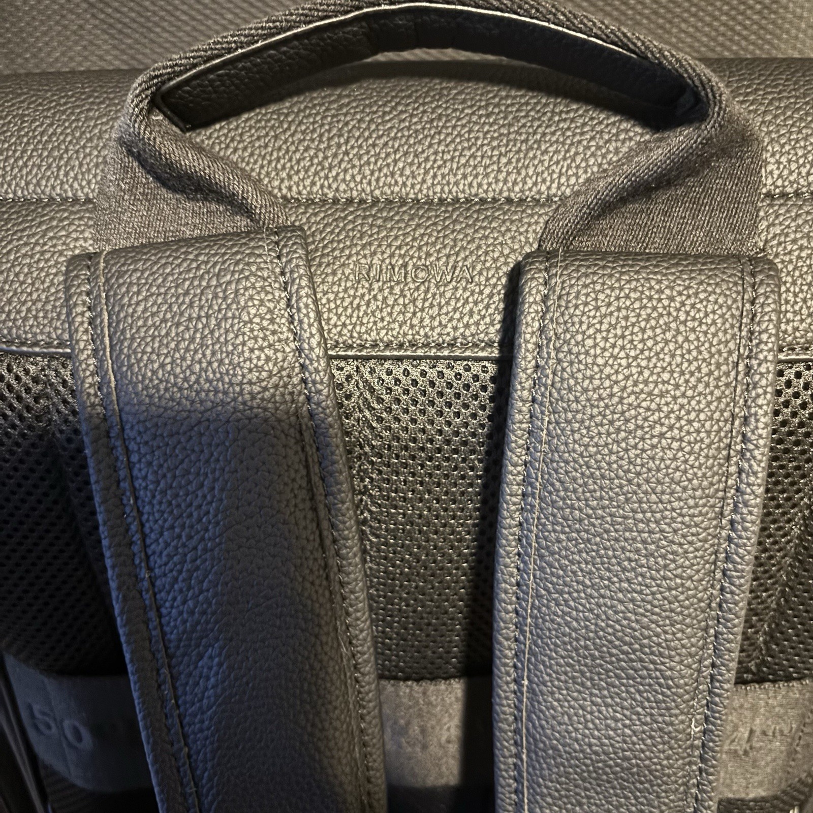 RIMOWA Black Backpack Buckle Flap Zip Closure Outer Side Pockets Double Handles