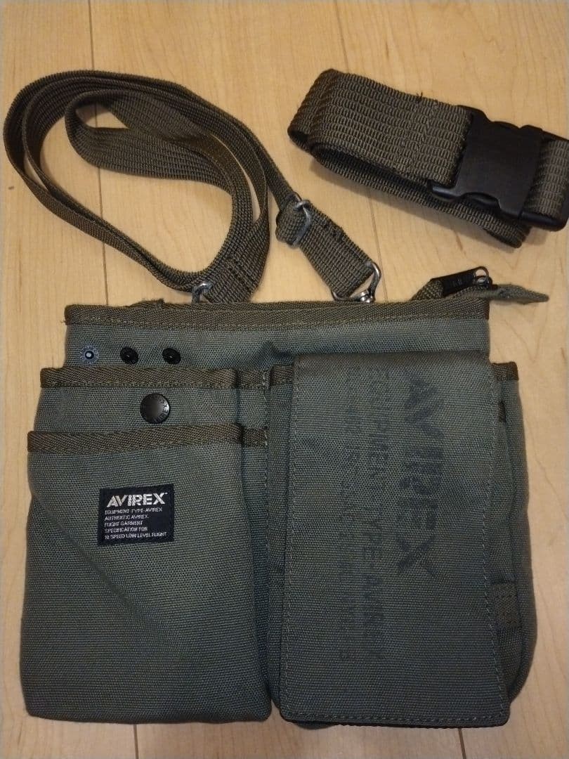 AVIREX olive green canvas body bag with multiple pockets used