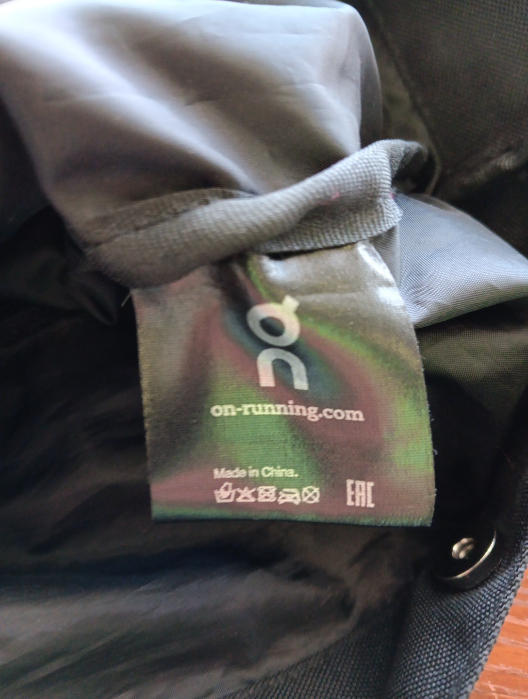 On Running Backpack Black Unisex Adjustable Straps Snap Close Lined Zip Pocket