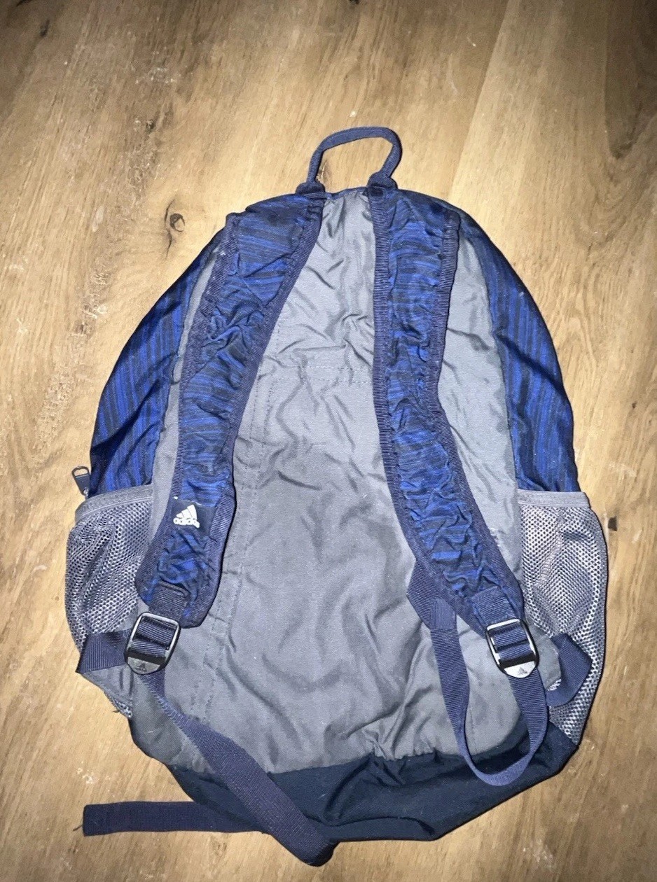 Adidas Blue Backpack with Vertical Black Stripes and Grey and Black Accents Used