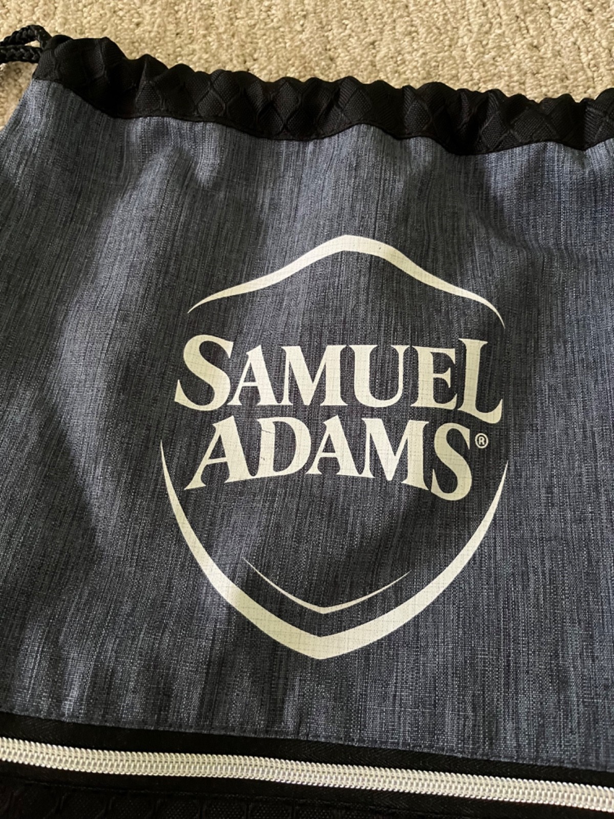 Samuel Adams Heather Navy/Black Drawstring Backpack Front Zip Pocket Logo