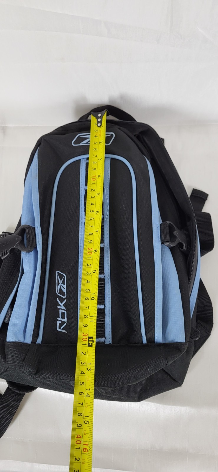 black and blue Reebok backpack