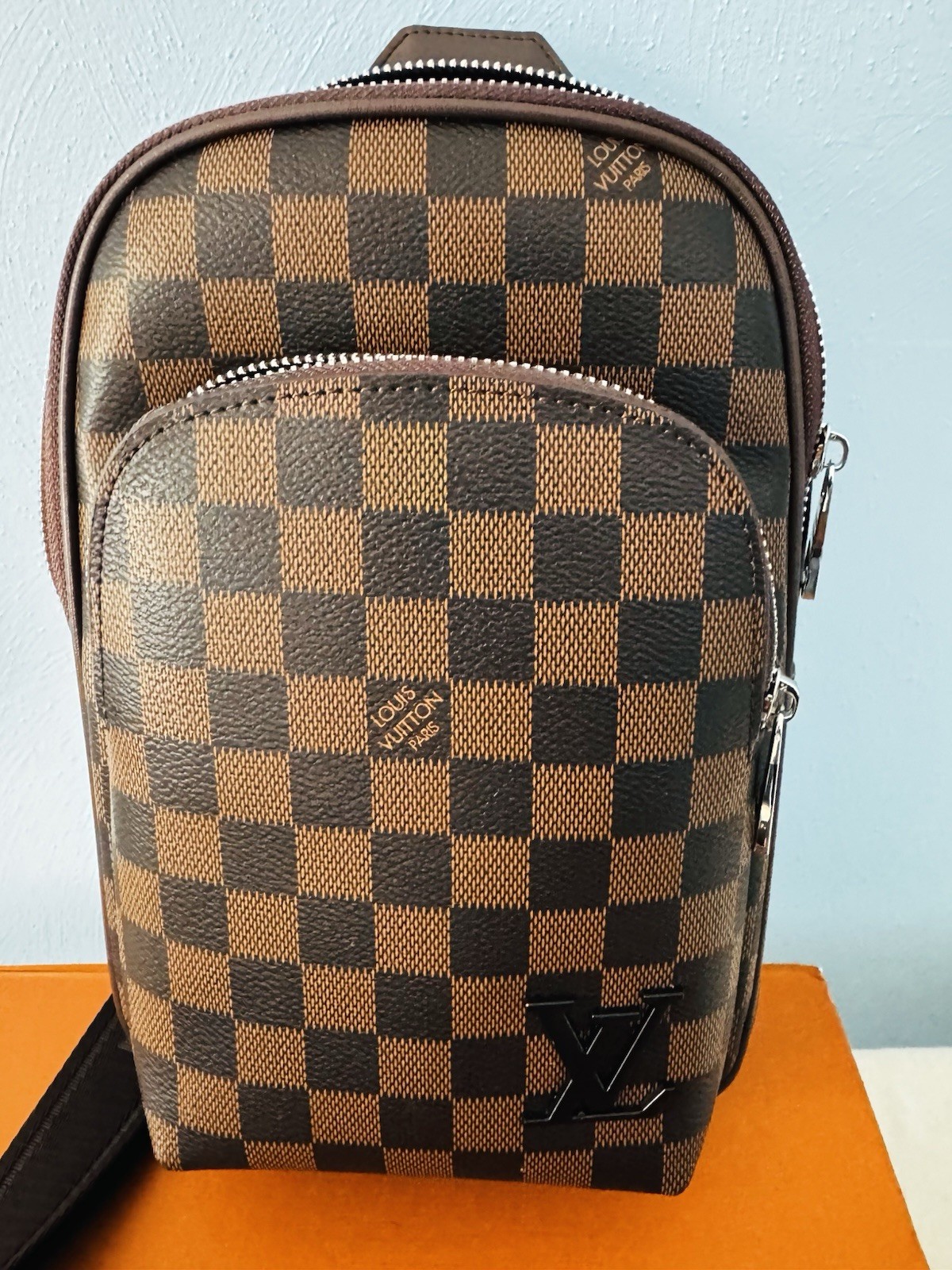 Louis Vuitton Brown Crossbody Sling Bag with Zip Closure