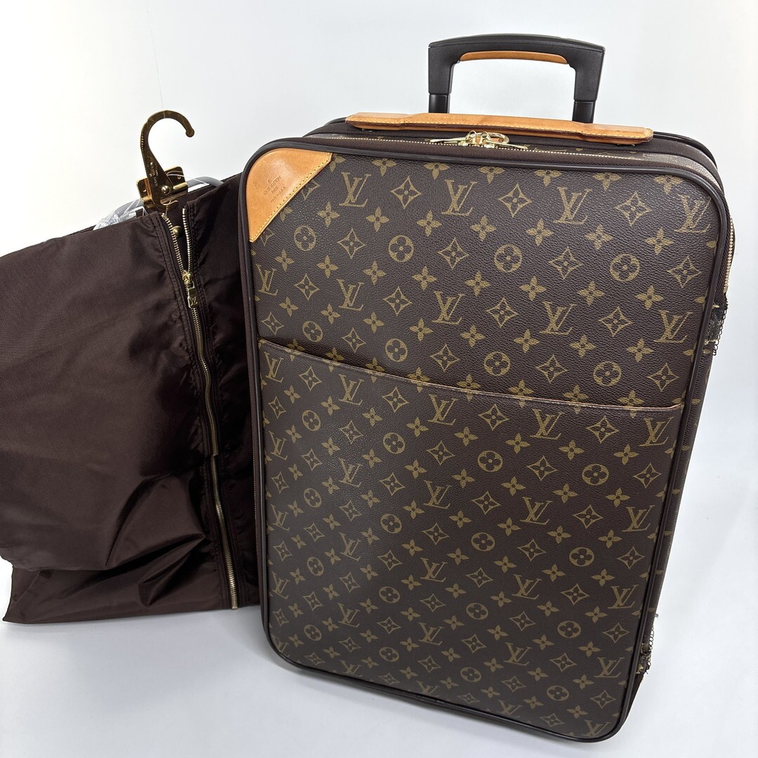 Louis Vuitton M23294 Monogram Pegase 55 carry-on suitcase in brown.