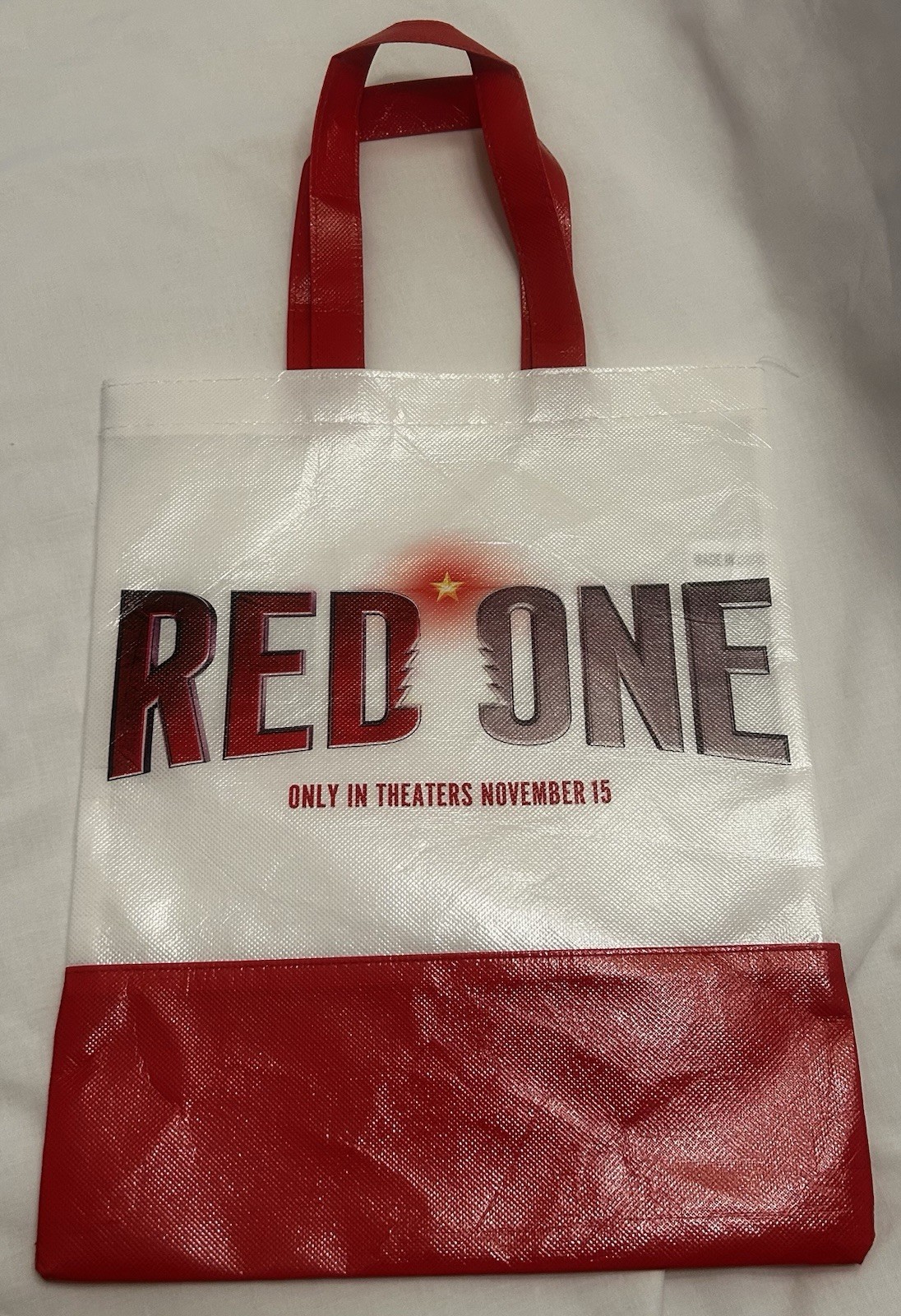The Movie ‘Red One’ 12×15 Plastic Red/White Promo Bag.