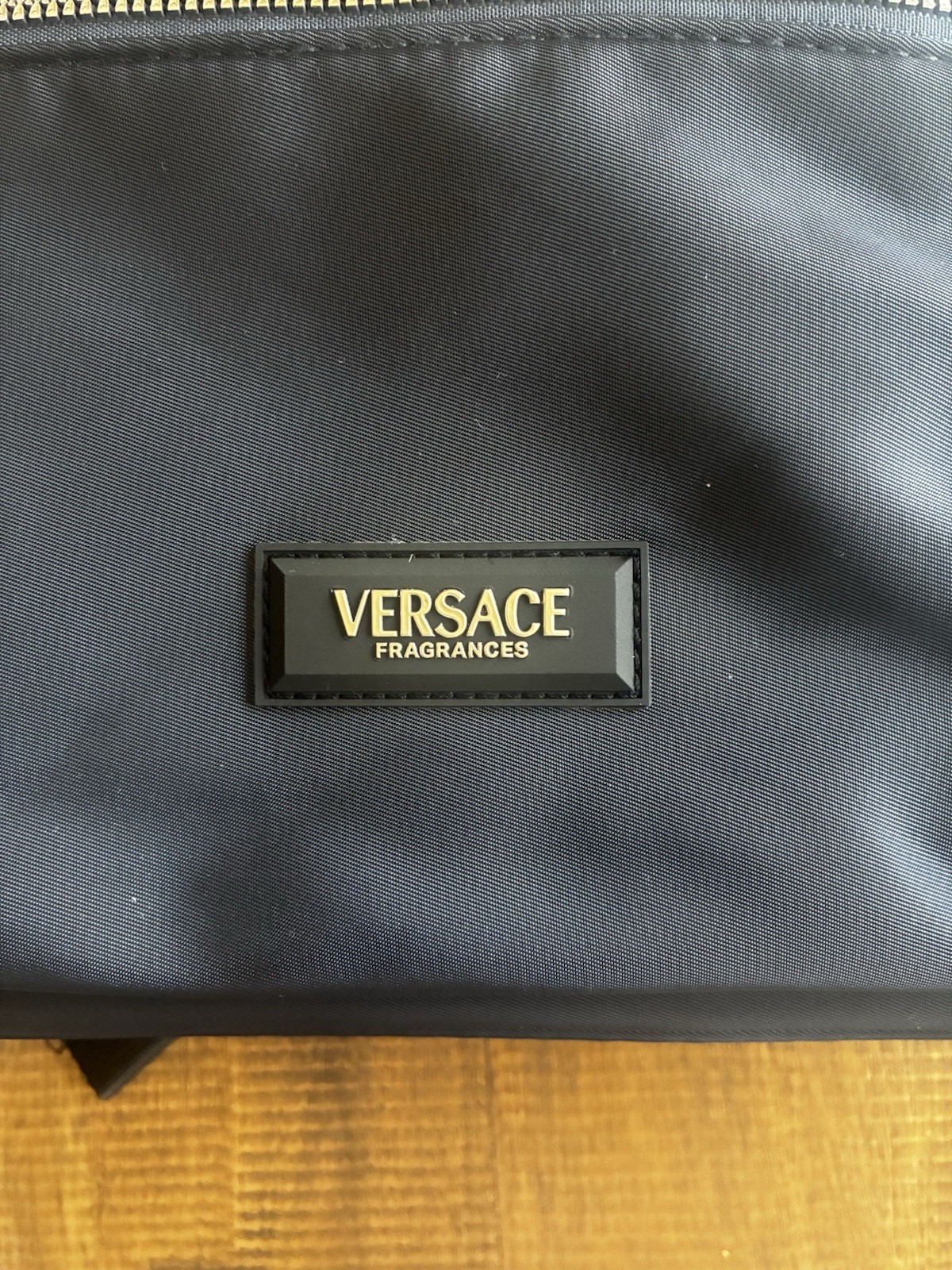 Versace Parfums Black Drawstring Backpack w/ Front Zip Pocket, Zip Closure