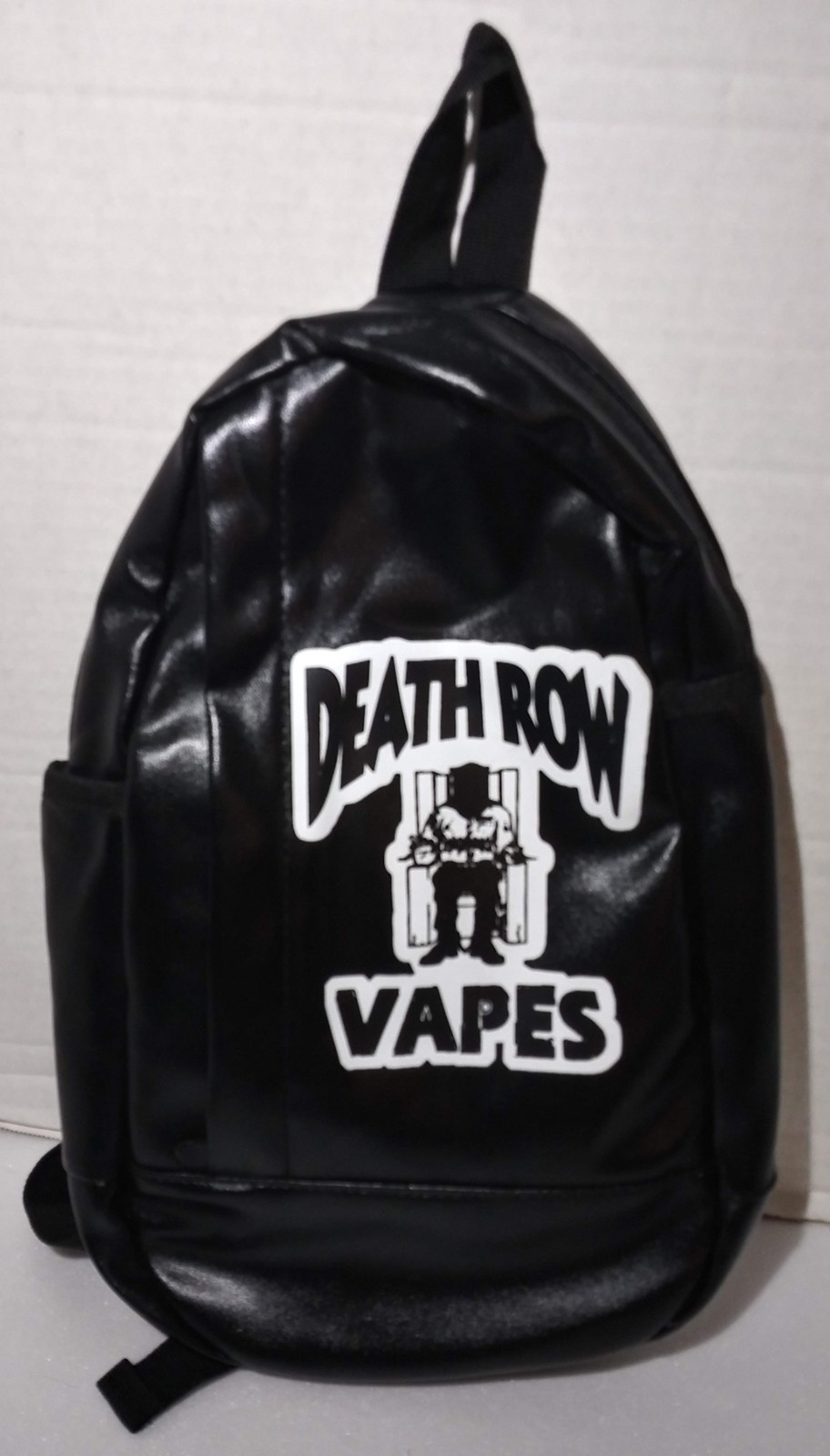 Death Row Vapes Backpack 14 x 8 x 4″ Single strap Black vinyl