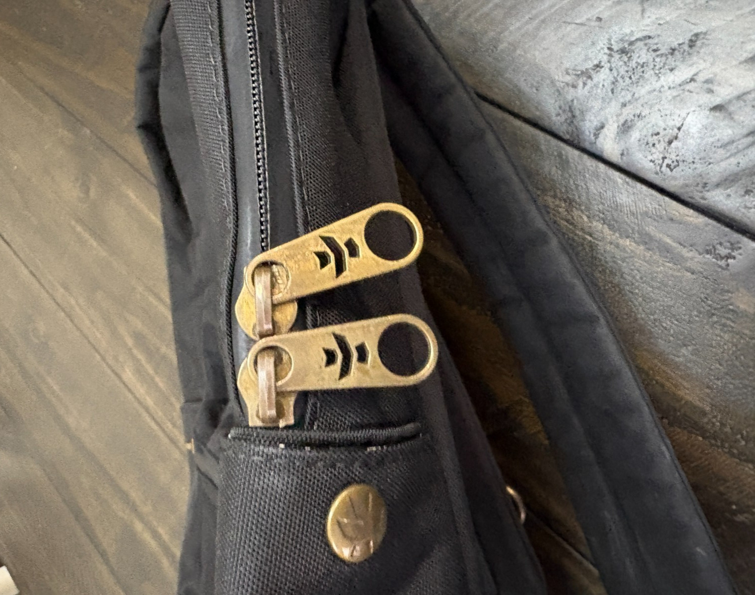 Revelry Water Resistant Black Tan Backpack Zipper needs repair see description