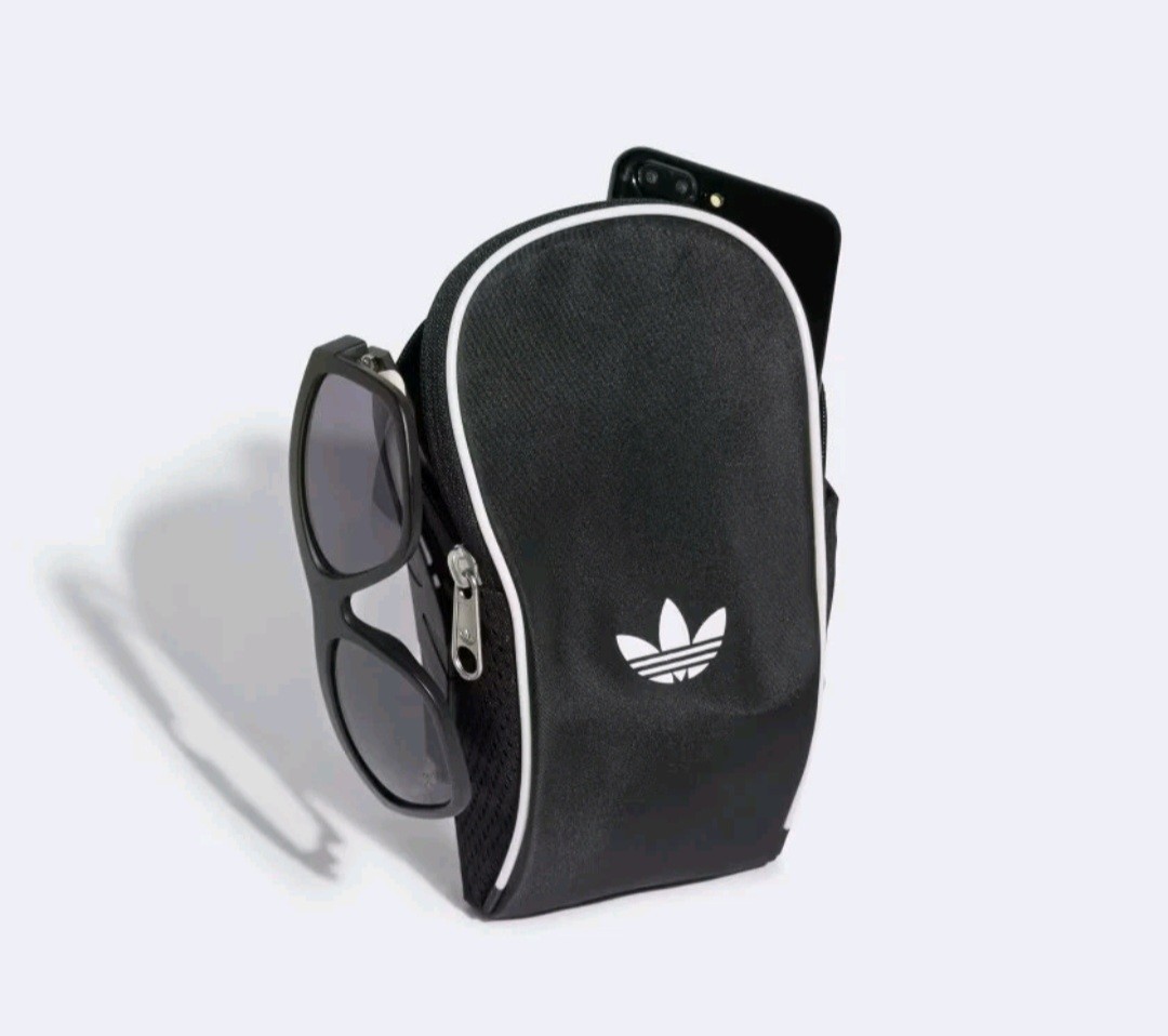 Adidas Adicolor Small Sling Bag (2″ x 5″ x 7″)