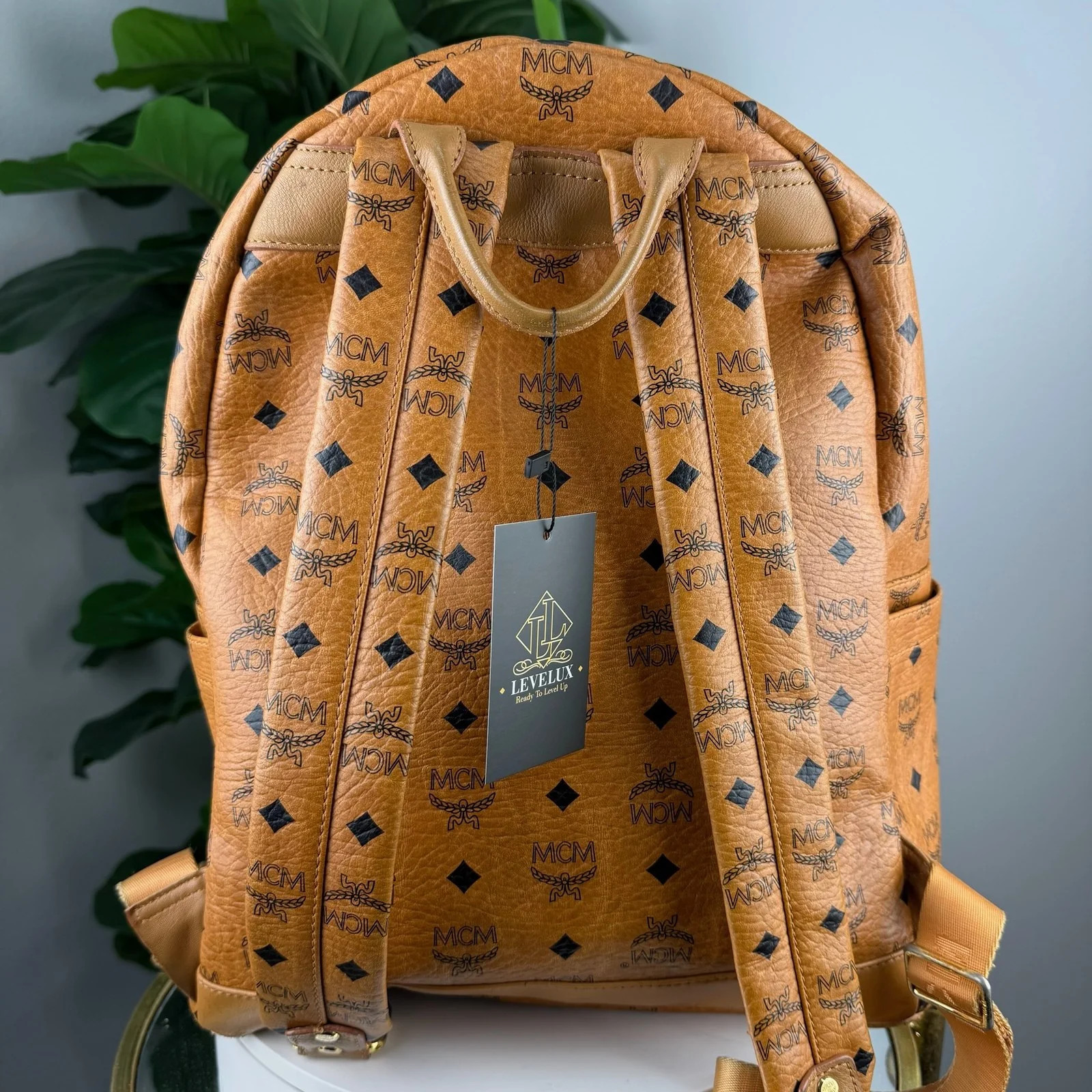 Authentic MCM Stark Studded Backpack Cognac Visetos