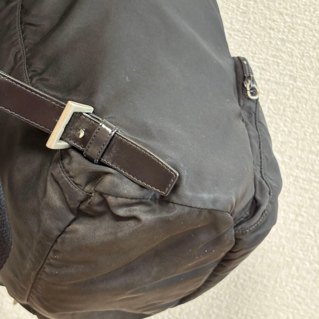 Prada Rucks Saffiano Triangular Plate