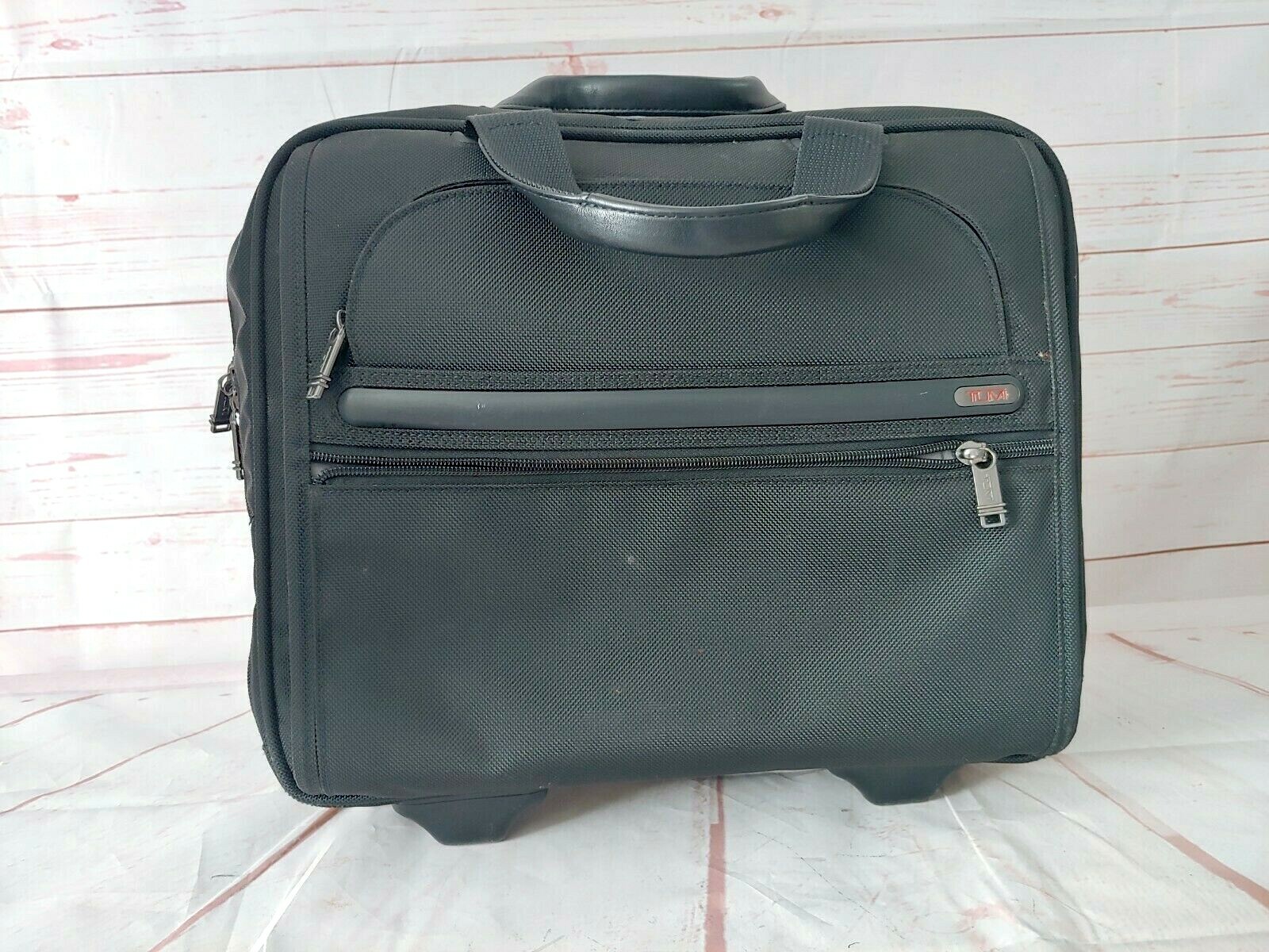 TUMI Black Wheeled Rolling Briefcase/Carry on Bag 15X13X6 Inches
