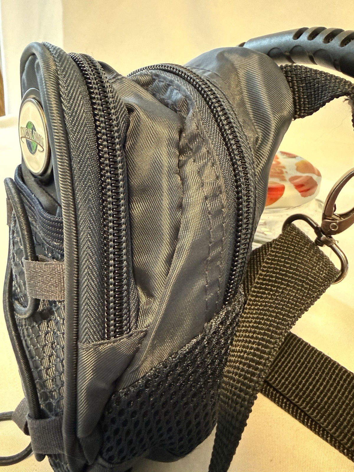 Universal Studios Navy Blue Mini Day Pack 7 X 5” Handle & Strap D Clip