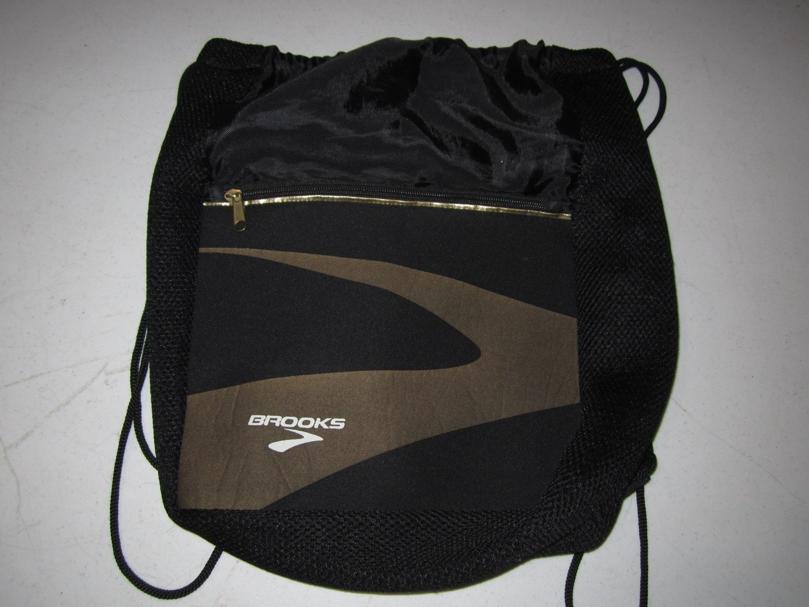 EUC Brooks 7 black & gold Drawstring bag with zipper compartment (RARE FIND)