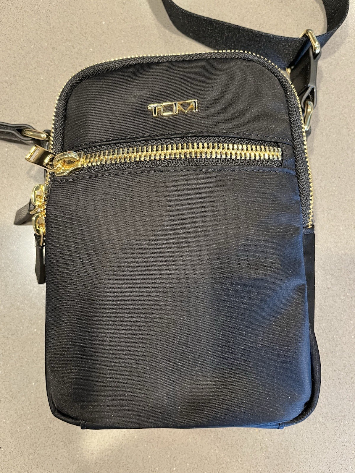 TUMI Black Small Crossbody Bag Adjustable Strap Zip Closure Pockets
