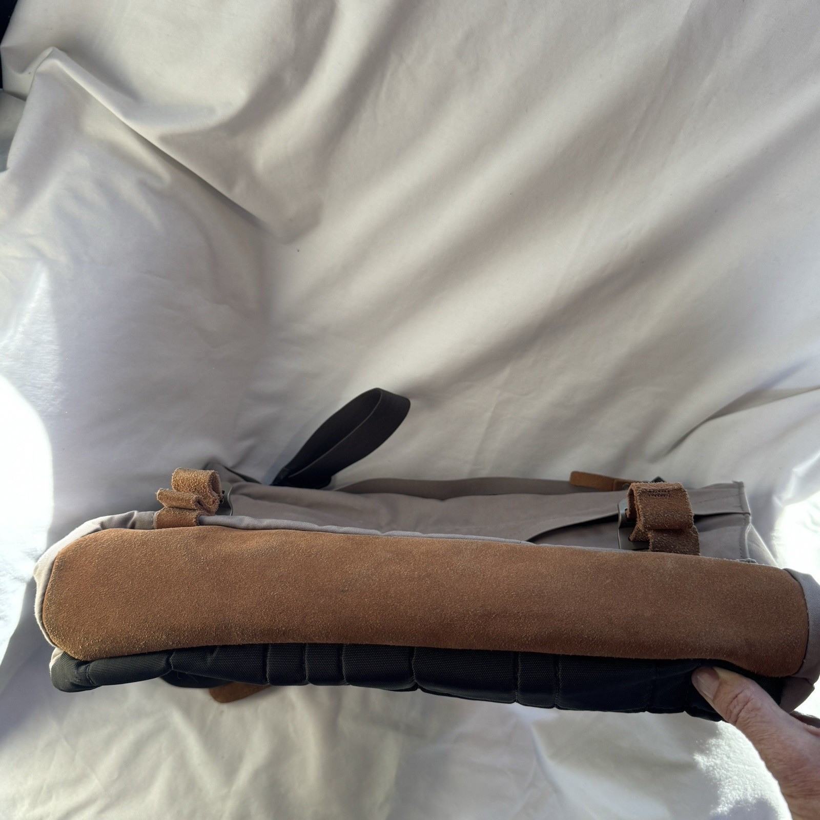 Cotopaxi computer messenger bag. Lots of pockets and company embroidered, Tan