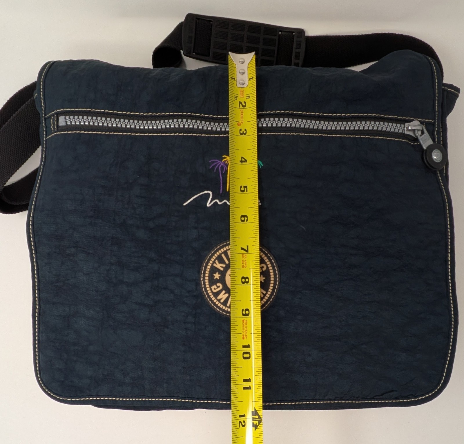 Kipling Madhouse Postman Bag Mirage Las Vegas Logo Expandable Messenger Bag Blue