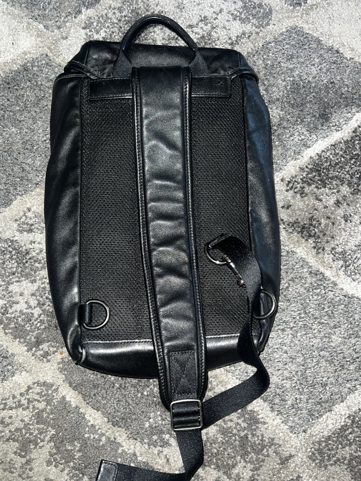 Coach Leather Sling Backpack well-organized, hands-free style, sleek design