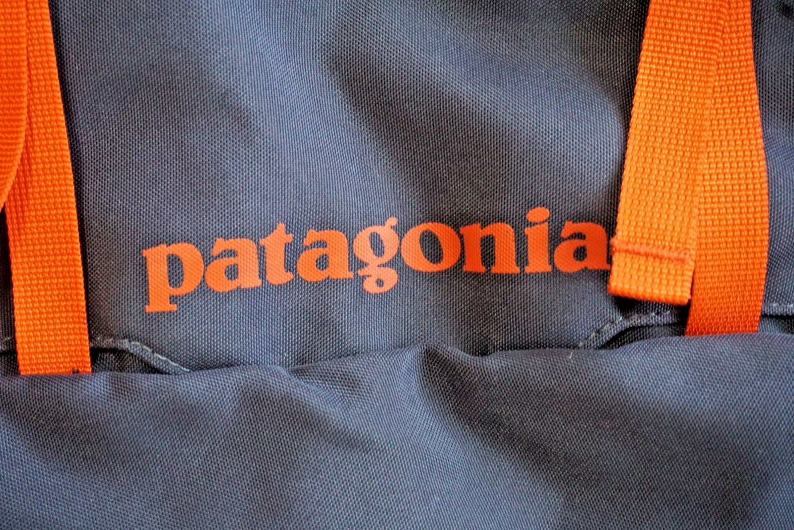Patagonia Atom Sling 8L Backpack Crossbody Daypack Navy Orange Hiking Travel