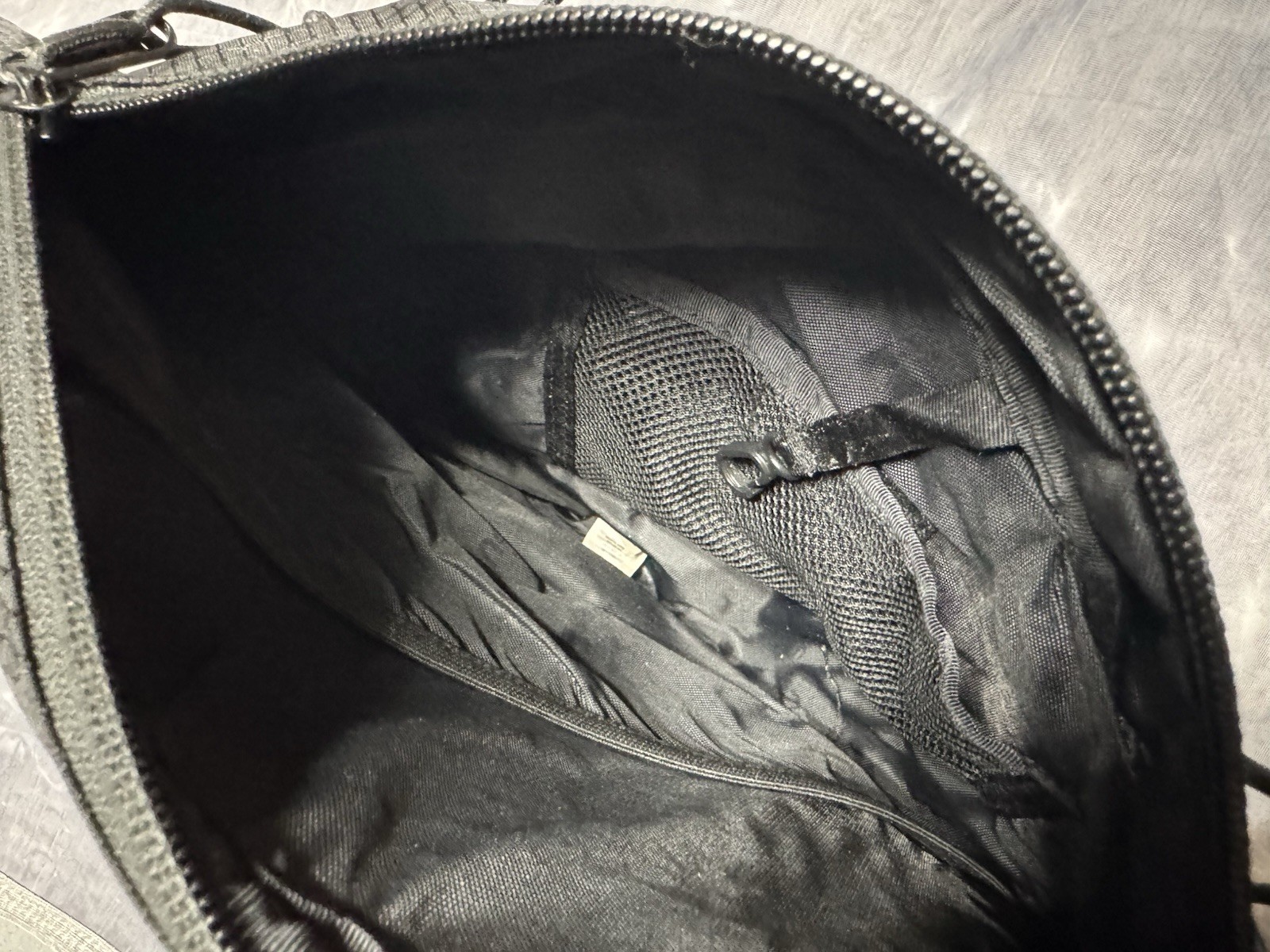 Supreme Sling Bag Black SS22, Adjustable Crossbody Sling Bag, Zippered Pockets.