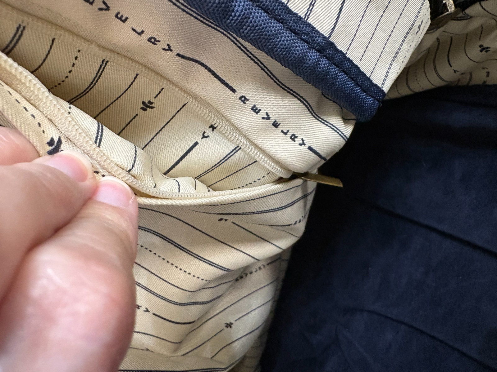 Revelry Water Resistant Black Tan Backpack Zipper needs repair see description