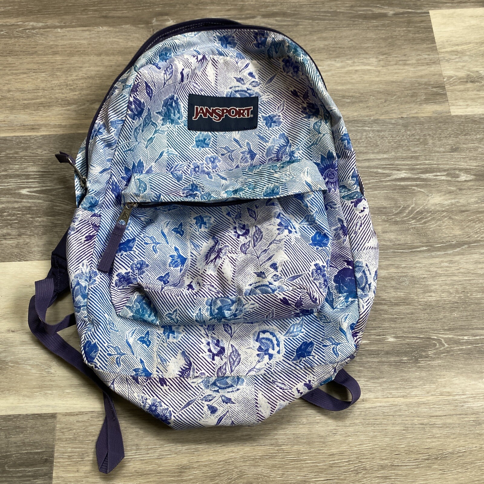 JanSport Superbreak backpack striped floral purple blue green