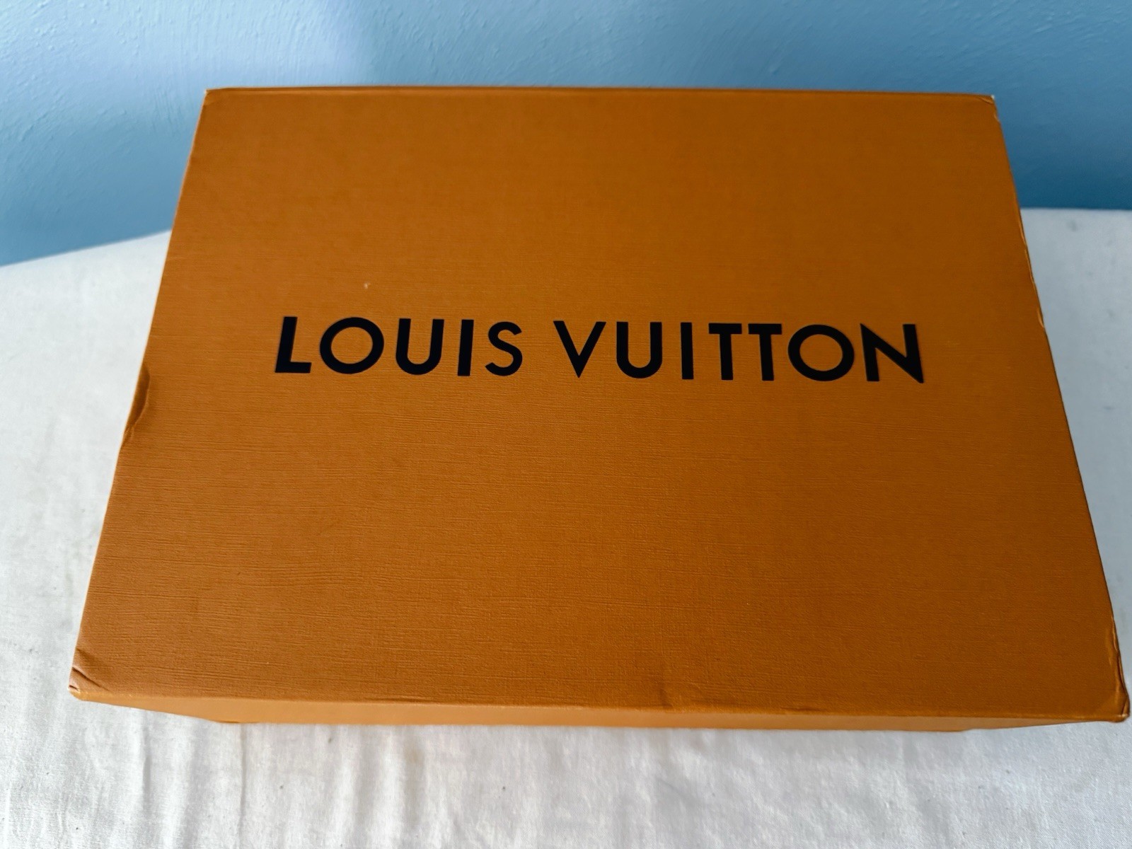 Louis Vuitton Brown Crossbody Sling Bag with Zip Closure