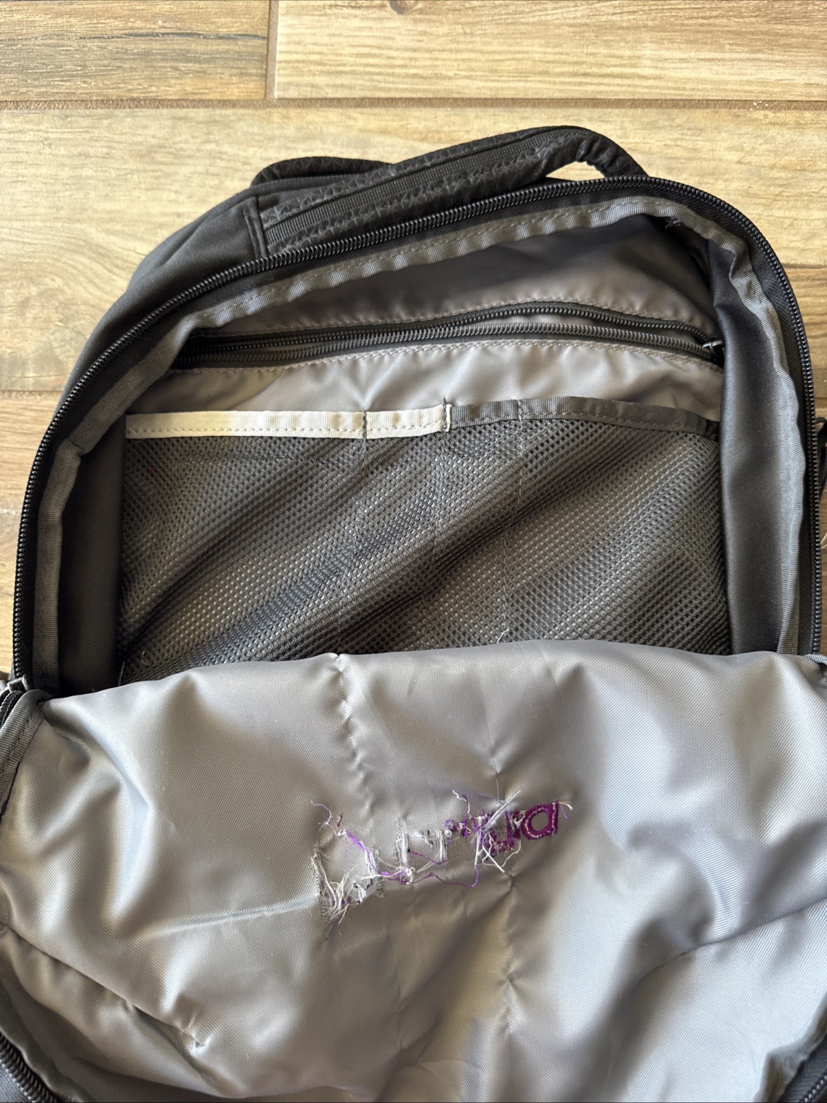 The North Face Stalwart Black Backpack 26L Laptop Sleeve Company Logo