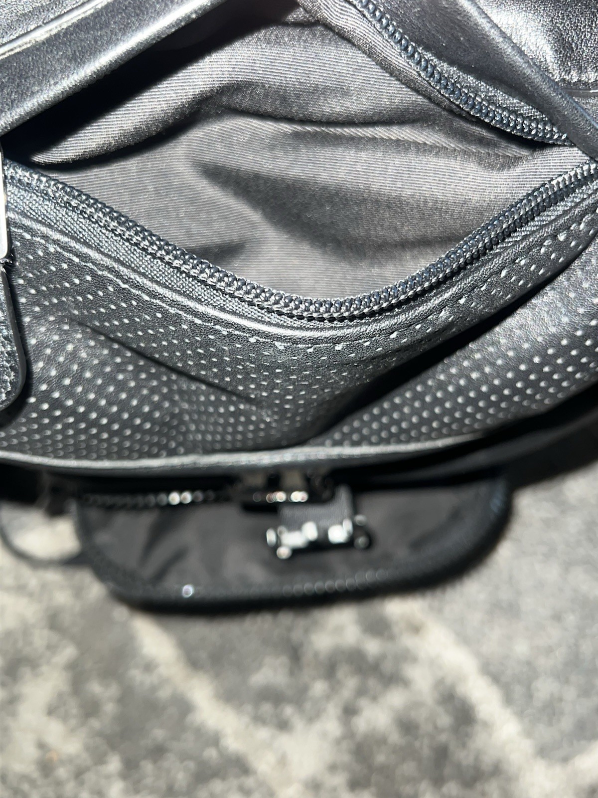 Coach Leather Sling Backpack well-organized, hands-free style, sleek design