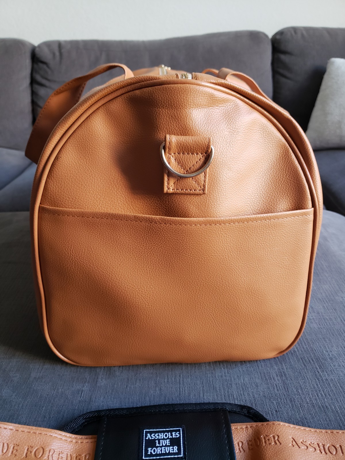 ASSHOLES*S LIVE FOREVER – Emotional Baggage Camel Tan Faux Leather BRAND NEW!