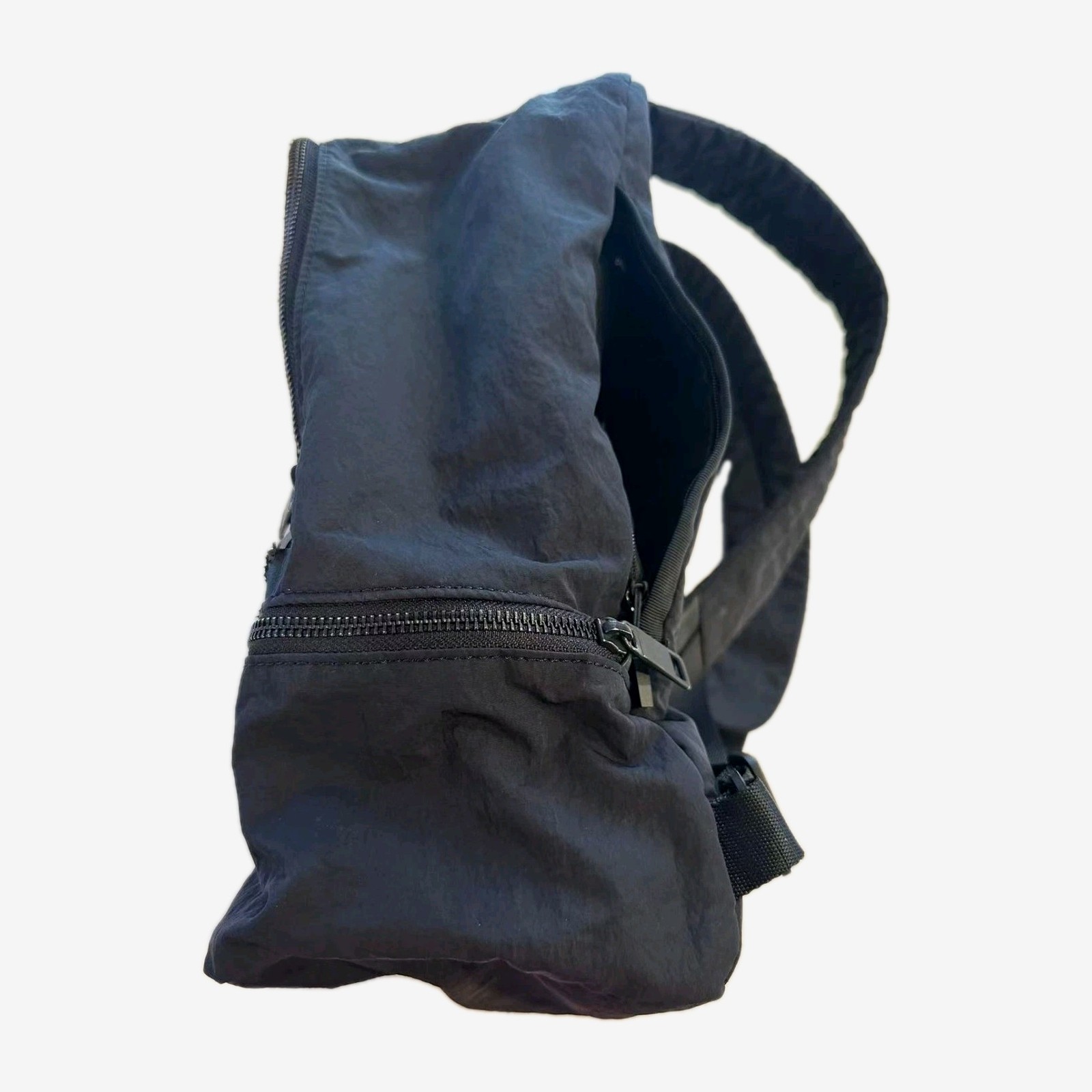 Black Lululemon City Adventurer backpack,iconic metal logo and waterproof fabric