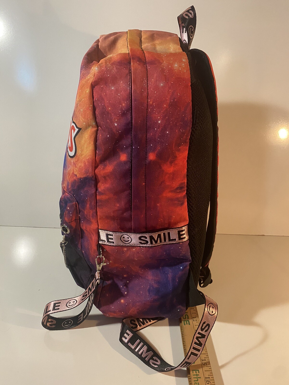 Backwoods Cigars Trippy Outer Space Smile Trim Adjustable Multicolor Backpack