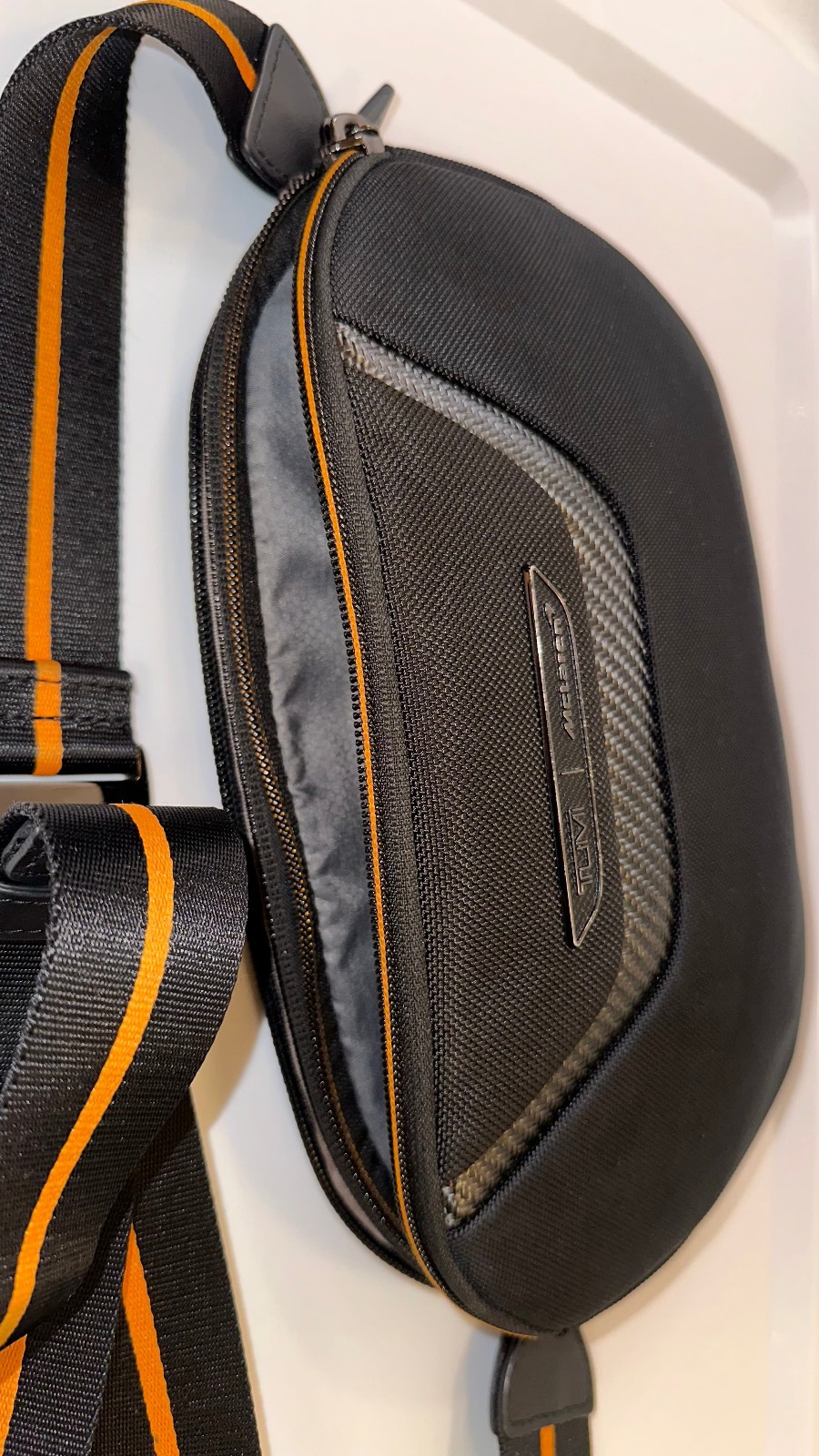 Tumi McLaren Lumin Utility Pouch Sling Crossbody Waist Bag Black Orange Travel